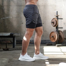 Charger l&#39;image dans la galerie, Shorts de course hommes
